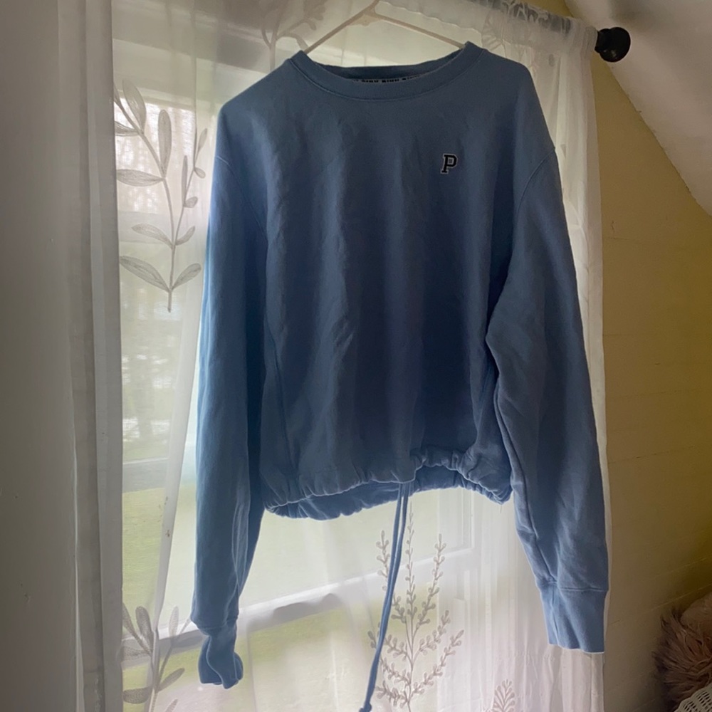 Large Pink drawstring sweatshirt.